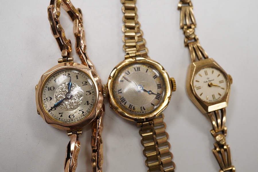 Two 9ct lady’s manual wind wrist watches on 9ct bracelets, gross weight 34 grams, including Smiths Imperial and another 9ct watch head on a rolled gold strap bracelet.